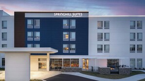 A modern hotel with a sign reading "Springhill Suites by Marriott." It features a multi-story building with a flat roof, large windows, and a well-lit entrance. - SpringHill Suites by Marriott Lexington Frankfort (Frankfort)