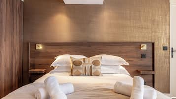 Junior Suite | 1 bedroom, in-room safe, iron/ironing board, free WiFi