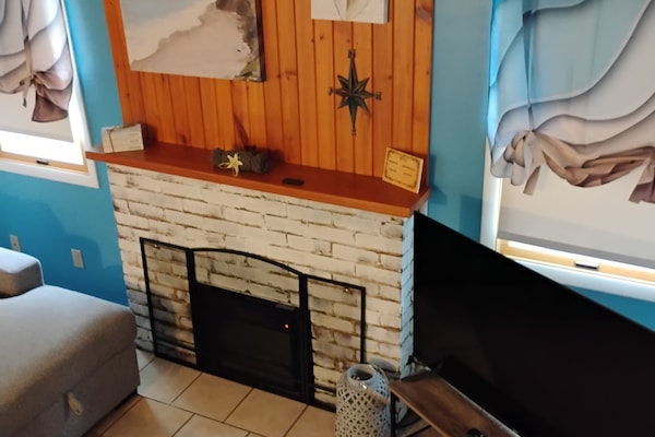 50 inch TV w/internet downstairs, 32 inch with game system upstairs!!!