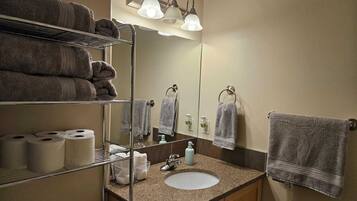 Hair dryer, towels, soap, shampoo