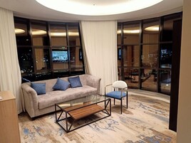 Junior Suite | 2 bedrooms, in-room safe, iron/ironing board, free WiFi