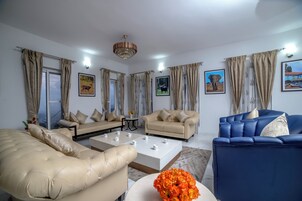 Villa, 5 Bedrooms | Living area | 40-inch LED TV with digital channels, pay movies