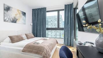 Departamento urbano, balcón | 1 habitación, tabla de planchar con plancha, wifi gratis y ropa de cama