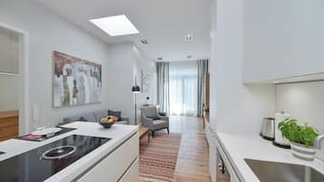 2-Room Apartment Cosy Gem 57 m² | Private kitchen | Full-size fridge, oven, stovetop, dishwasher