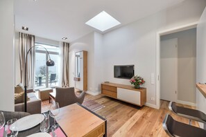 2-Room Apartment Garden Glow 58 m² | Living area - Downtown Apartments Living  (Berlin)