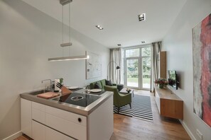Studio Leafy Terrace 51 m² | Living area - Downtown Apartments Living  (Berlin)