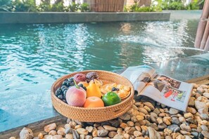 Indoor pool, open 5:00 AM to 8:00 PM, pool loungers