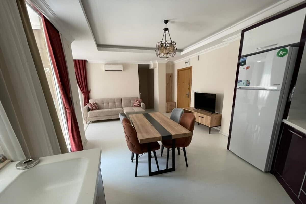 Basic Apartment, 1 Bedroom | Living area | 24-inch TV with satellite channels