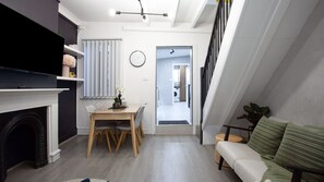 Smart TV, fireplace, books