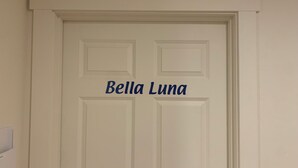 A white door with the name "Bella Luna" written on it. - Downtown Friday Harbor! Newly Built! BL (Friday Harbor)