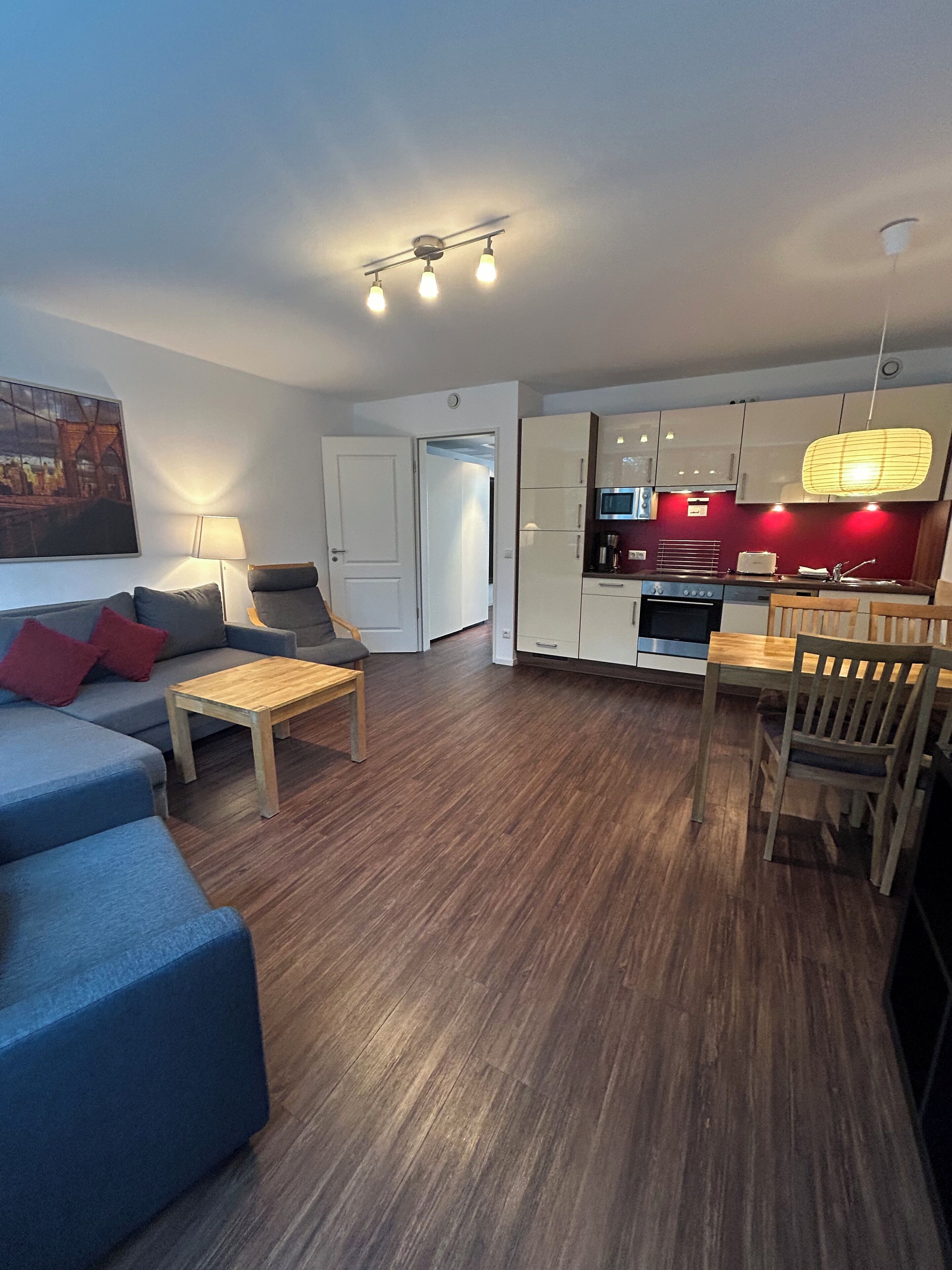 Apartment | Living area | 50-inch TV with cable channels