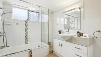 Shower, hair dryer, towels