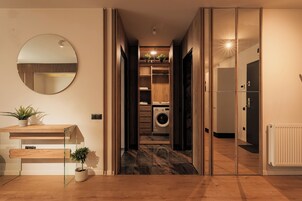 Business Apartment, Balcony, Garden View | Living area | Flat-screen TV