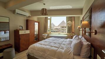 Luxury Single Room, City View | Free minibar, in-room safe, individually decorated