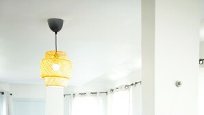 A hammock hanging from a ceiling, a white door, and a tiled floor. - Faro Escondido Pool&Jacuzzi OceanView in Fajardo (Fajardo)