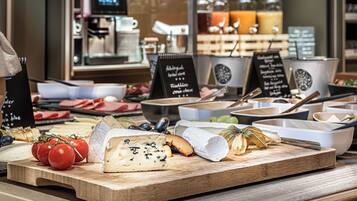 Daily buffet breakfast (EUR 29.50 per person)