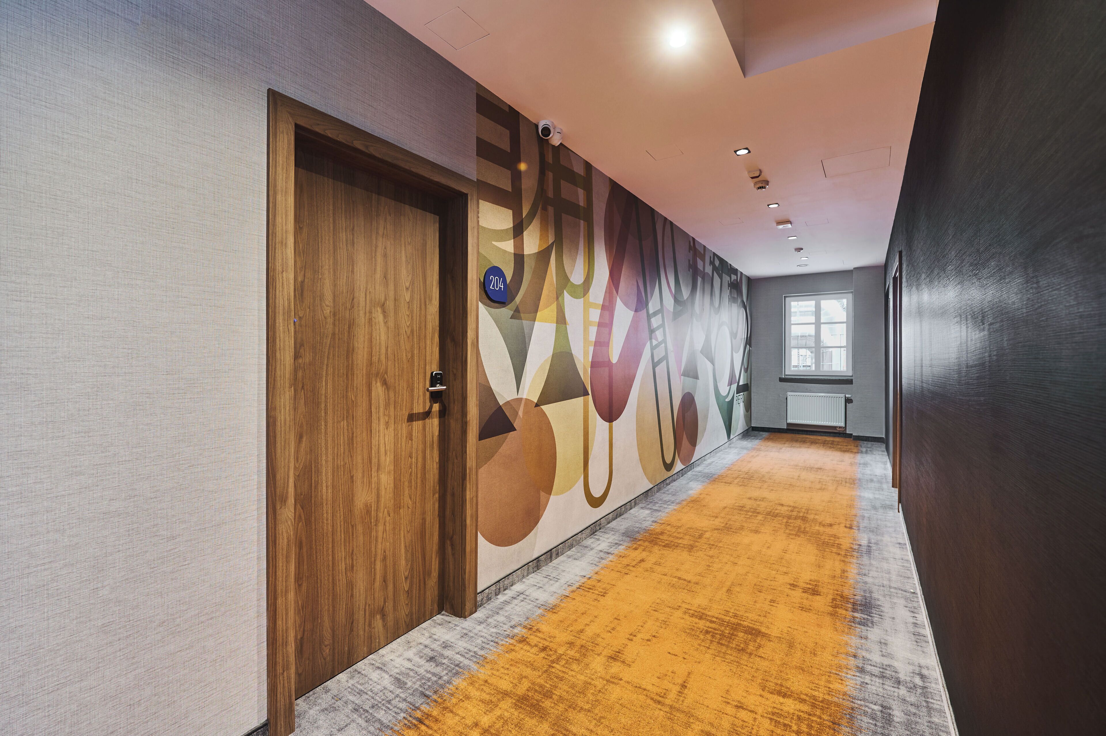 Deluxe Double or Twin Room | Living area | TV, computer monitors, printers