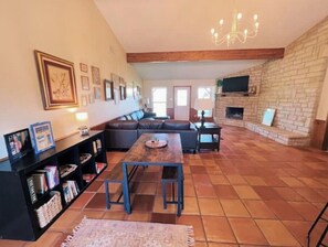 Smart TV, fireplace, books