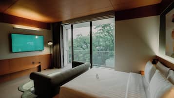 Junior Suite | 1 bedroom, blackout drapes, free WiFi