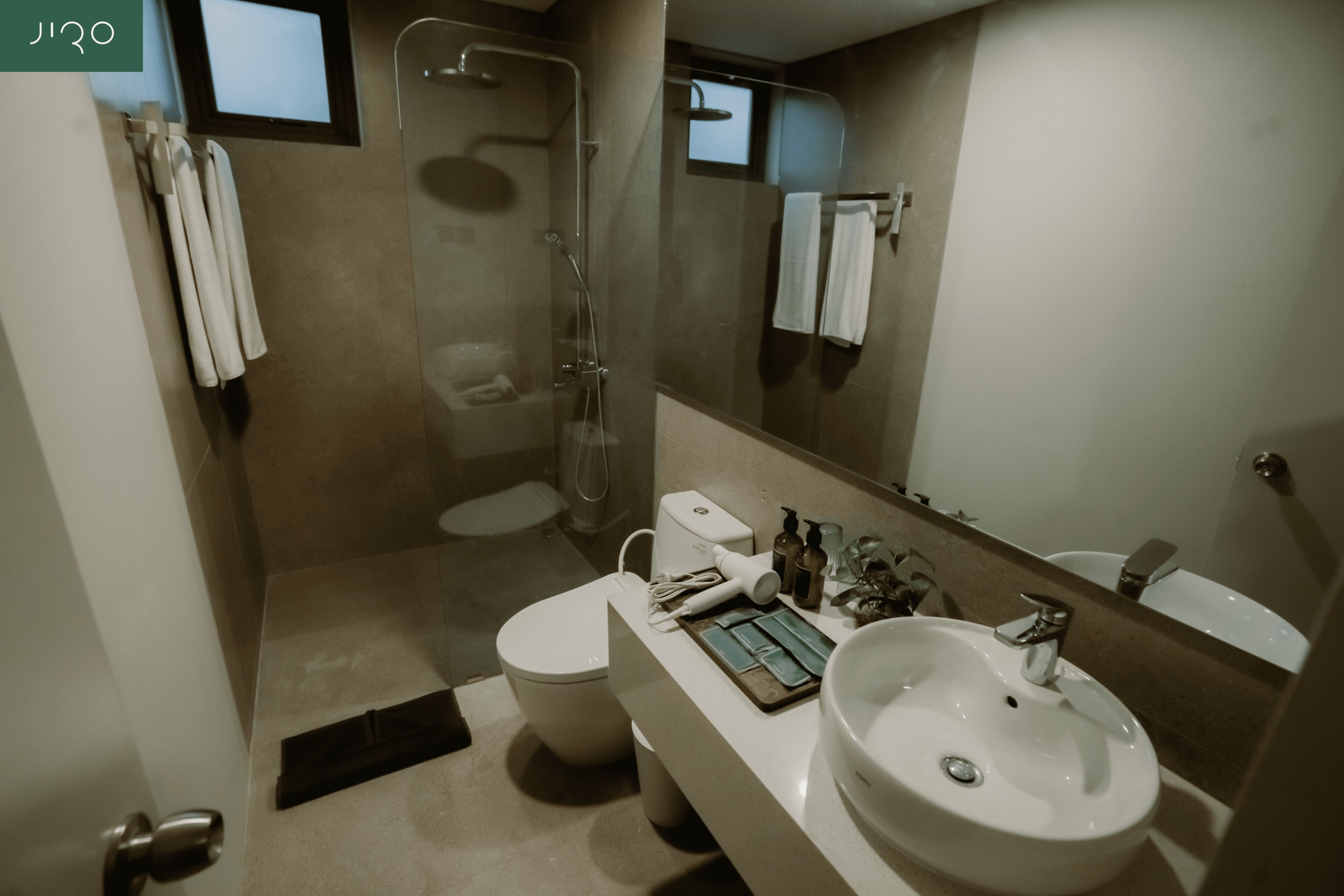 Shower, slippers, towels, soap