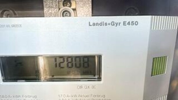 A digital display on a device labeled 'Landis Gyr E450' with a reading of '12808'. - 8 Person Holiday Home in Pandrup (Pandrup)