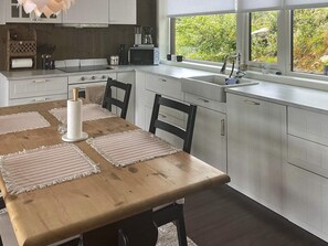 Private kitchen - 8 Person Holiday Home in Tau (Strand)