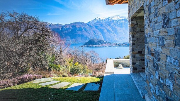 A stone building with a view of a lake and mountains. - The Great Beauty, beautiful property with amazing view on the lake of Como (Lombardia)