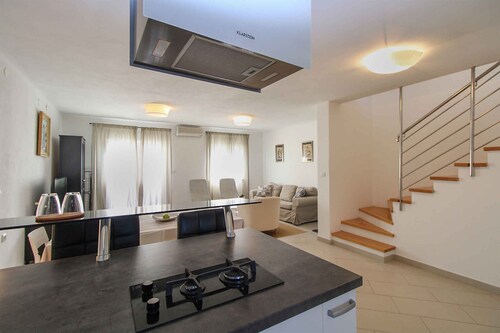 Ferienhaus mit Terrasse und Klimaanlage