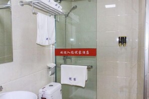A bathroom with a glass shower enclosure, a white sink, and a toilet. There is a towel rack with a white towel hanging on it. - Bengbu Youjia Express Hotel (Greenland Century City) (Bengbu)