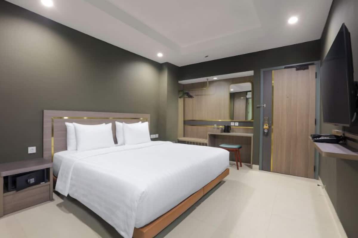 Deluxe kamer, 1 slaapkamer | 1 slaapkamer, beddengoed