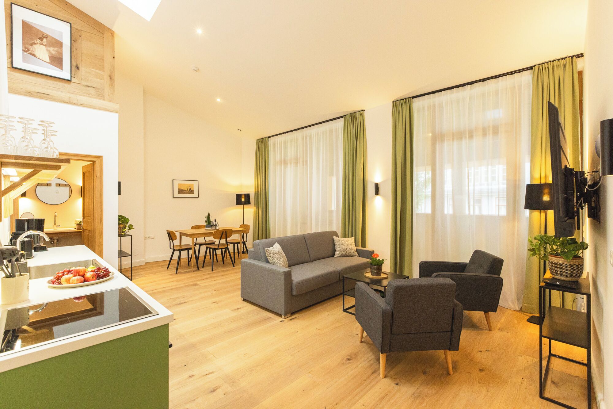 Comfort Apartment | Living area | 109-cm Smart TV with premium channels, first-run movies, heated floors