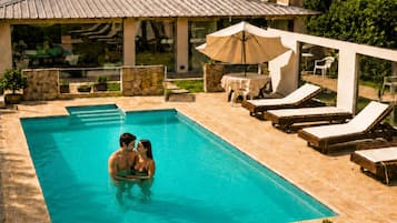 Indoor pool, 6 outdoor pools, open 9:00 AM to 9:00 PM, pool umbrellas