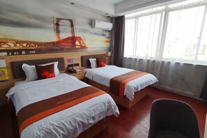 A hotel room with two beds, a large window with curtains, a painting of a bridge, and a chair. - Junyi Chain Hotel (Haiyan Qiyuan Chengbei East Road) (Haiyan)