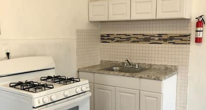 Spacious 2 bedroom apartment with 1 bathroom and private street entrance