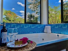 Suite, Pool View | In-room safe, blackout drapes, free WiFi