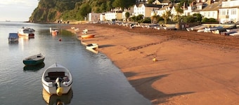 2 bed wing ON the beach in historic building. Quaint level seaside village.