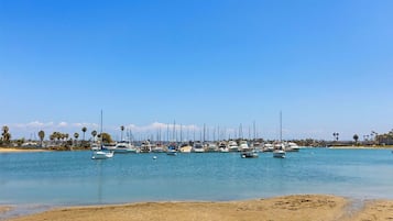 On the beach, sun loungers, beach towels