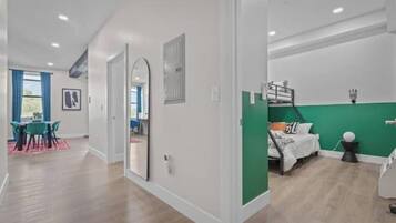 2 bedrooms, desk, iron/ironing board, travel crib