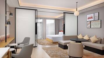 Deluxe Suite, 1 King Bed | Soundproofing, iron/ironing board