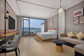 Premium Room, 1 King Bed | Living area | TV