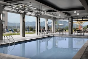 Indoor pool, seasonal outdoor pool, pool umbrellas, sun loungers