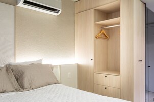 Elite Suite | Premium bedding, desk, laptop workspace, blackout drapes