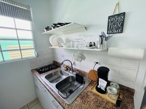 Fridge, microwave, stovetop, coffee/tea maker - Wendy's Cozy Nest (San Juan)