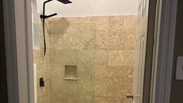Shower, towels, soap, toilet paper