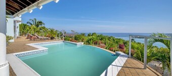 Vacation Villa Style home with 4 bedrooms and WiFi, AC in fabulous Montego Bay.