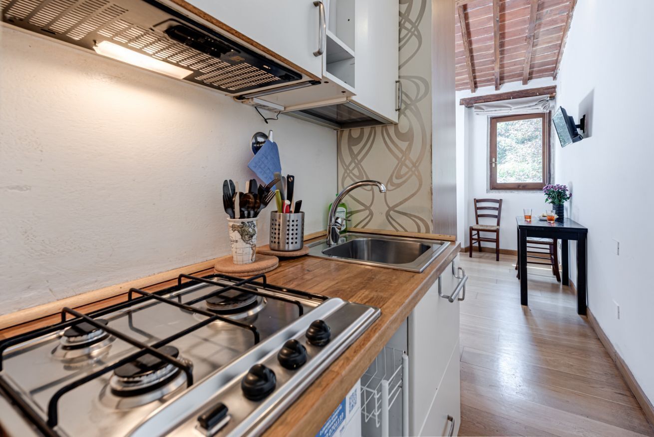 Fridge, stovetop, coffee/tea maker, cookware/dishes/utensils