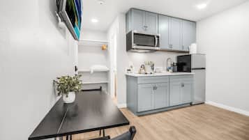 Fridge, microwave, stovetop, coffee/tea maker