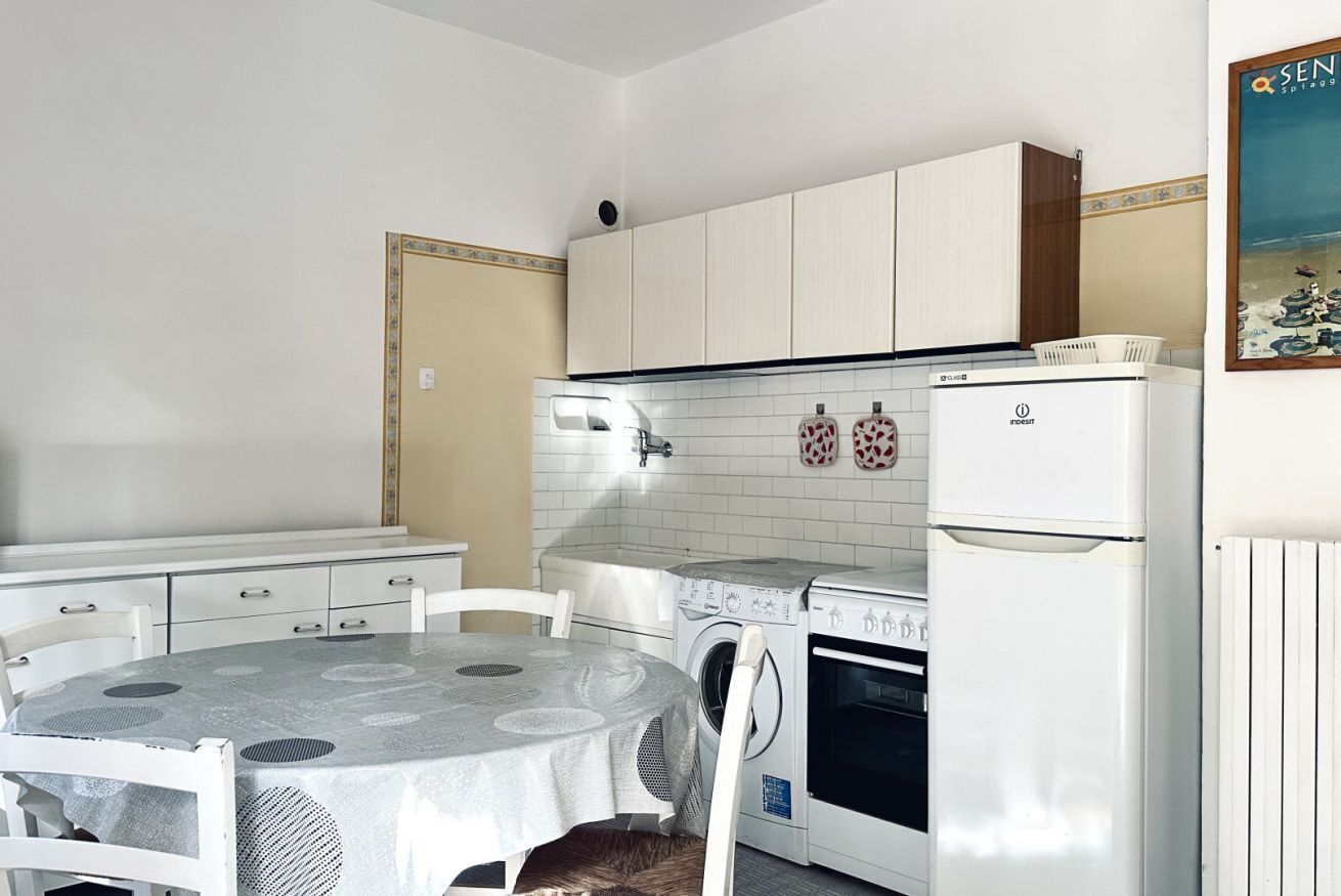 Fridge, oven, dining tables