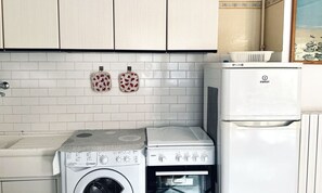 Fridge, oven, dining tables