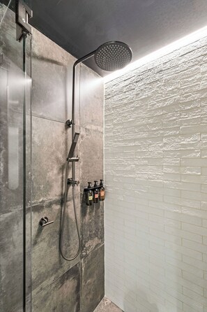 Shower, hair dryer, towels, soap